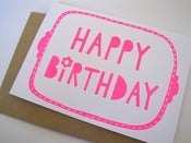Image of HAPPY BIRTHDAY greetings card in bright fluoro pink