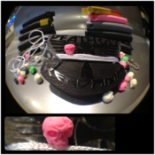 Image of deathray keychain/string holder with string and skull bead 