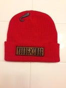 Image of YOUNG SWAG "Brown Ostrich Plaque"Red beanie