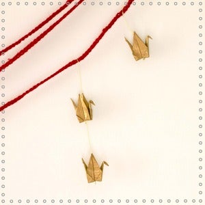 Image of Guirlande Migration "red&nbsp;gold"