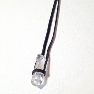 Image of quartz crystal on leather necklace