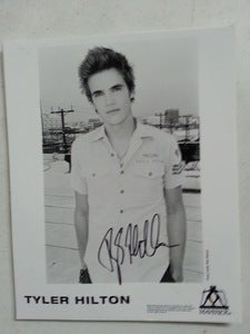 Image of Signed White Shirt Photo