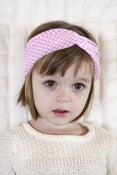 Image of pink and white checkered turban