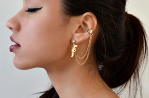 Image of Gold gun earcuff