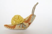 Image of Soft Sculpture Snail with Yellow Ceramic Shell