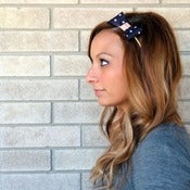 Image of the lil' leather bow- navy polka dot bow headband