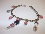 Image of Pulsera charms blancos geishas