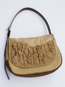 Image of - S O L D - a large tough ruffles shoulder bag in vintage lace + beige