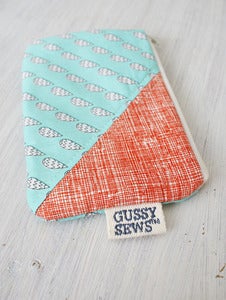 Image of Teal Rain + Orange medium zip pouch