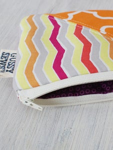 Image of Orange Zebra + Lattice square zip pouch