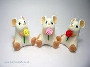 Image of Little White Mouse with Rose