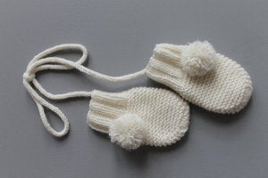 Image of Moufles bébé en cachemire avec pompon