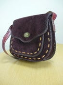 Image of heavy brown suede saddlebag handbag