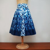 View full pleated skirt in original 1960s daube border print
