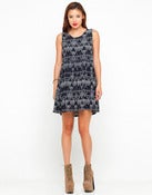 Image of Polly babydoll dress in black pyramid print by Motel