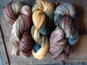 Image of softly, brightly, murky. hand-dyed sock yarns.