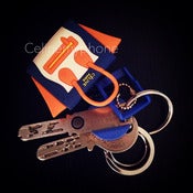 Image of WITH LOGO - Céline my phone Headphone Plug - orange/blue/white