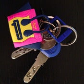 Image of WITH LOGO - Céline my phone Headphone Plug - pink/yellow/blue
