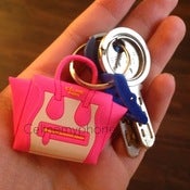 Image of WITH LOGO - Céline my phone decorative headphone plug - pink/white