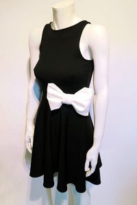 Image of bow open back stretch jersey skater mini dress