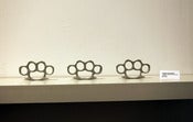 Image of CEMENT BRASS KNUCKLES BY THOMAS BUILDMORE