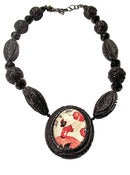Image of Maiden Carved Resin Necklace by Hotcakes Designs