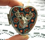 Image of Stag's Head miniature music box locket - speckled blue