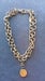 Image of Bronze double chain w coin