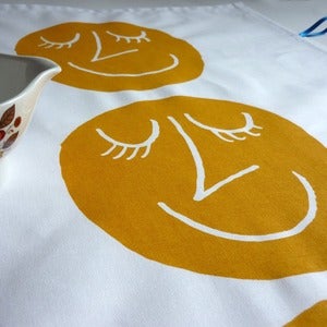Image of Happy Heads tea towel - mustard