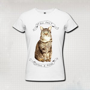 Image of "Still Isn't Giving a Fuck" Cat T-shirt