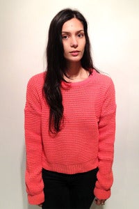 Image of knitted coral crop oversized jumper
