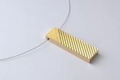 Image of 'naname' gold plated pendant    a